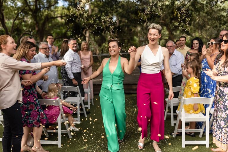A relaxed island wedding with pizza, colour, and all their favourite people in one place